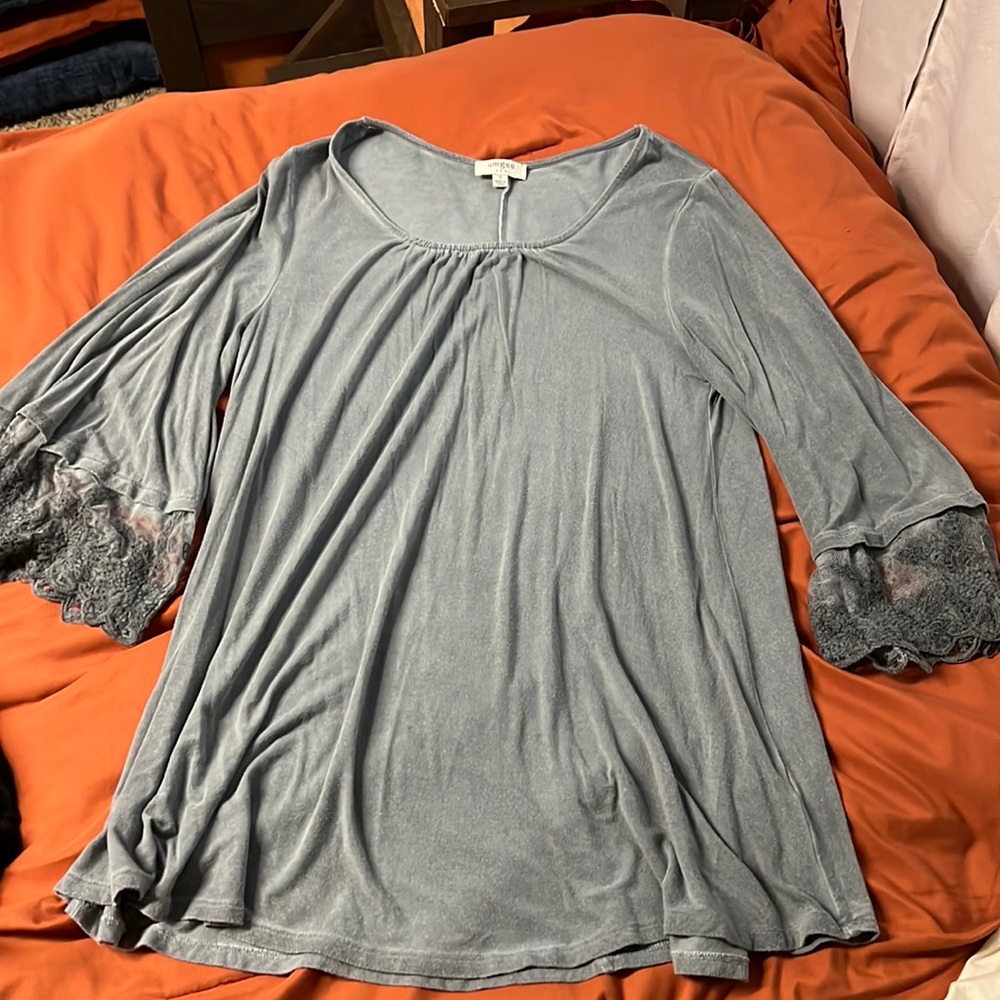 Umgee blouse size small but could fit a medium